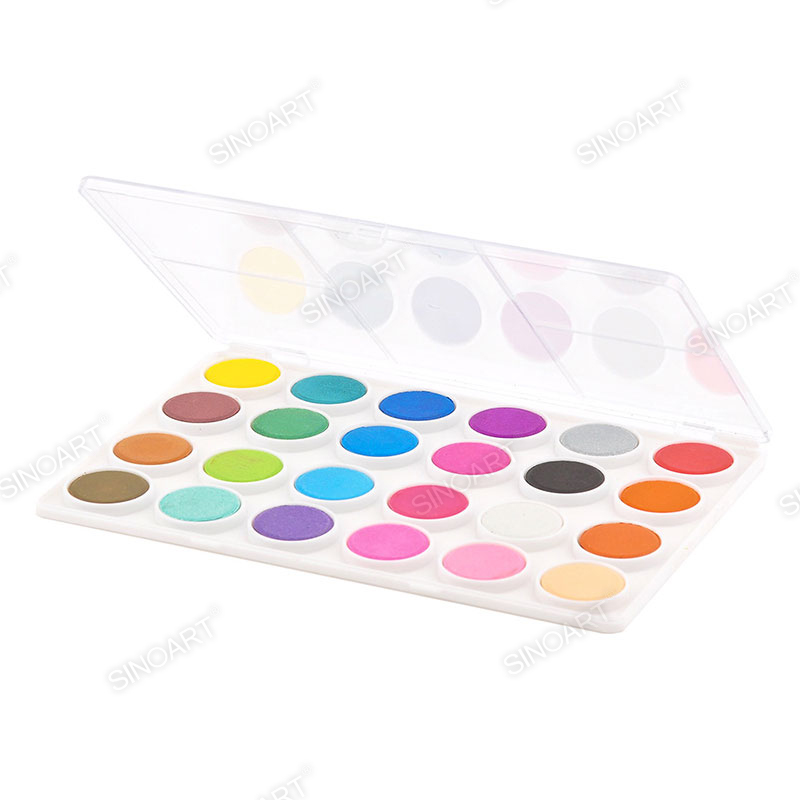 Watercolor cakes in plastic box watercolor paints